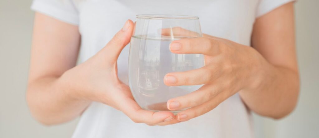 healthy-girl-holding-glass-water